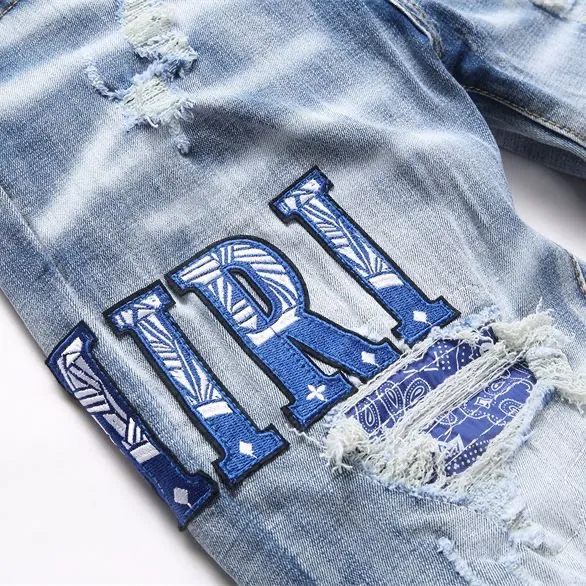 P168 💰 AMIRI patch embroidery jeans trousers AMIRI high street basic ripped tight elastic jeans trousers amiri brand jeans break the production process and cutting of the original jeans, the fabrics are softer and more comfortable Hand-sewn collar label Customized logo buttons Genuine leather tag Color: Picture color Size: 30-32-34-36