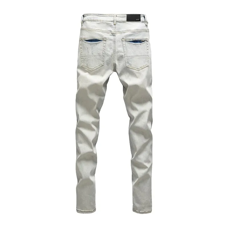 #N15 P246💰 (Top version) AMIRI hot high street jeans slim fit stretch washed knife cut trousers for men AMIRI amiri is transliterated as Emil, which is the name of the founder. Mike Amiri, the founder of amiri, grew up in Los Angeles, USA. He was influenced by local street culture and Punk Rock since he was a child, so he founded the amiri brand named after himself. A variety of trendy clothing meets the needs of different trendy players. Amiri clothing has novel and unique styles and is a well-known street brand in the United States. The styles and styles of many clothes are loved by many street photographers. The various clothing styles meet the dressing needs of different people, show their unique temperament, and show the trend of dressing. amiri's jeans are relatively famous. Not only do they have many styles, but the quality of the jeans is also very good. Many celebrities have also worn amiri brand jeans. Color: Picture color Size: 28, 30, 32, 34, 36 28 30 32 34 36 Waist 71 76 81 86 91 Qianlang 26.5 27.5 28.5 29.5 30.5 Hou Lang 37 38 39 40 41 Foot 14 14.8 15.6 16.4 17.2 Foreign Minister 100 102 104 106 107
