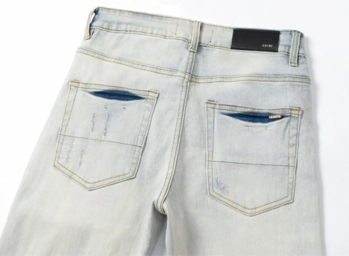 #N15 P246💰 (Top version) AMIRI hot high street jeans slim fit stretch washed knife cut trousers for men AMIRI amiri is transliterated as Emil, which is the name of the founder. Mike Amiri, the founder of amiri, grew up in Los Angeles, USA. He was influenced by local street culture and Punk Rock since he was a child, so he founded the amiri brand named after himself. A variety of trendy clothing meets the needs of different trendy players. Amiri clothing has novel and unique styles and is a well-known street brand in the United States. The styles and styles of many clothes are loved by many street photographers. The various clothing styles meet the dressing needs of different people, show their unique temperament, and show the trend of dressing. amiri's jeans are relatively famous. Not only do they have many styles, but the quality of the jeans is also very good. Many celebrities have also worn amiri brand jeans. Color: Picture color Size: 28, 30, 32, 34, 36 28 30 32 34 36 Waist 71 76 81 86 91 Qianlang 26.5 27.5 28.5 29.5 30.5 Hou Lang 37 38 39 40 41 Foot 14 14.8 15.6 16.4 17.2 Foreign Minister 100 102 104 106 107