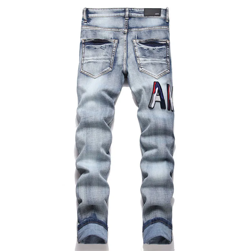 P186 Top replica AMIRI splash-ink medal patch embroidered jeans trousers AMIRI high street basic ripped tight stretch jeans trousers Amiriamiri is transliterated as Emil, which is the name of the founder. Mike Amiri, the founder of amiri, grew up in Los Angeles, USA. He was influenced by the local street culture Rock since childhood, so he founded the amiri brand named after himself. A variety of trendy brand clothing meets the needs of different fashion players. Amiri clothing has novel and unique styles and is a well-known street brand in the United States. Many of its styles and styles are loved by many street photographers. Various clothing styles meet the needs of different people, show their unique temperament, and show the trend of dressing. amiri's jeans are relatively famous. Not only do they have many styles, but the quality of the jeans is also very good. Many celebrities have also worn amiri brand jeans.  The jeans of the amiri brand break through the production process and cutting of the original jeans. The fabrics are relatively soft and comfortable, and are not as hard as some jeans, which can irritate the skin and cause the skin to bleed when worn. Los Angeles trendy brand Amiri's jeans are made with great detail from tailoring to texture, adding wrinkles, bullet holes, damage and other details to add to the trendiness of the jeans. You can choose the style that suits you according to your own needs. Only when you wear a suitable style can you have a certain sense of fashion.  In recent years, high street has become an increasingly common word in men's clothing, and high street style has become an important direction for everyone's matching. High street-related items are basically inseparable from oversize or drop-shoulder tops, and the lower body is matched with trackpants or tight-fitting denim. Among them, in my opinion, the most representative one is perhaps annihilation. Color; picture color Size: m l xl xxl plain goat takeaway