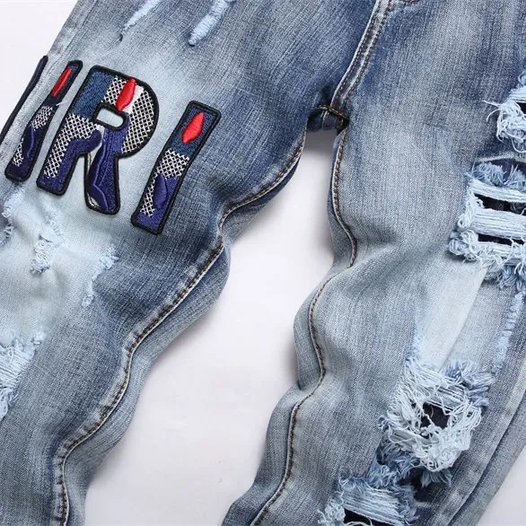 P168 💰 AMIRI patch embroidery jeans trousers AMIRI high street basic ripped tight elastic jeans trousers amiri brand jeans break the production process and cutting of the original jeans, the fabrics are softer and more comfortable Hand-sewn collar label Customized logo buttons Genuine leather tag Color: Picture color Size: 30-32-34-36