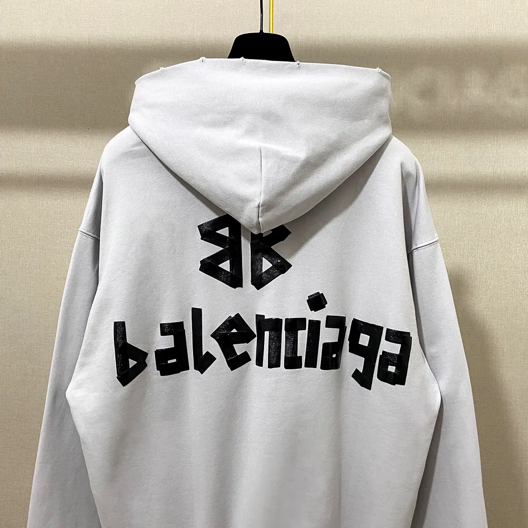 🅿️310 7110# Real photos Top version [BALENCIA*GA] Official website quality Paris new tape series hooded sweatshirt OS version Loose dropped shoulders Uniform style for men and women Fabric: 480g 100% cotton terry sweater Technology: Front and back printing Garment wash Worn Distressed Fixed color Color: black blue off-white Size: XS S M L