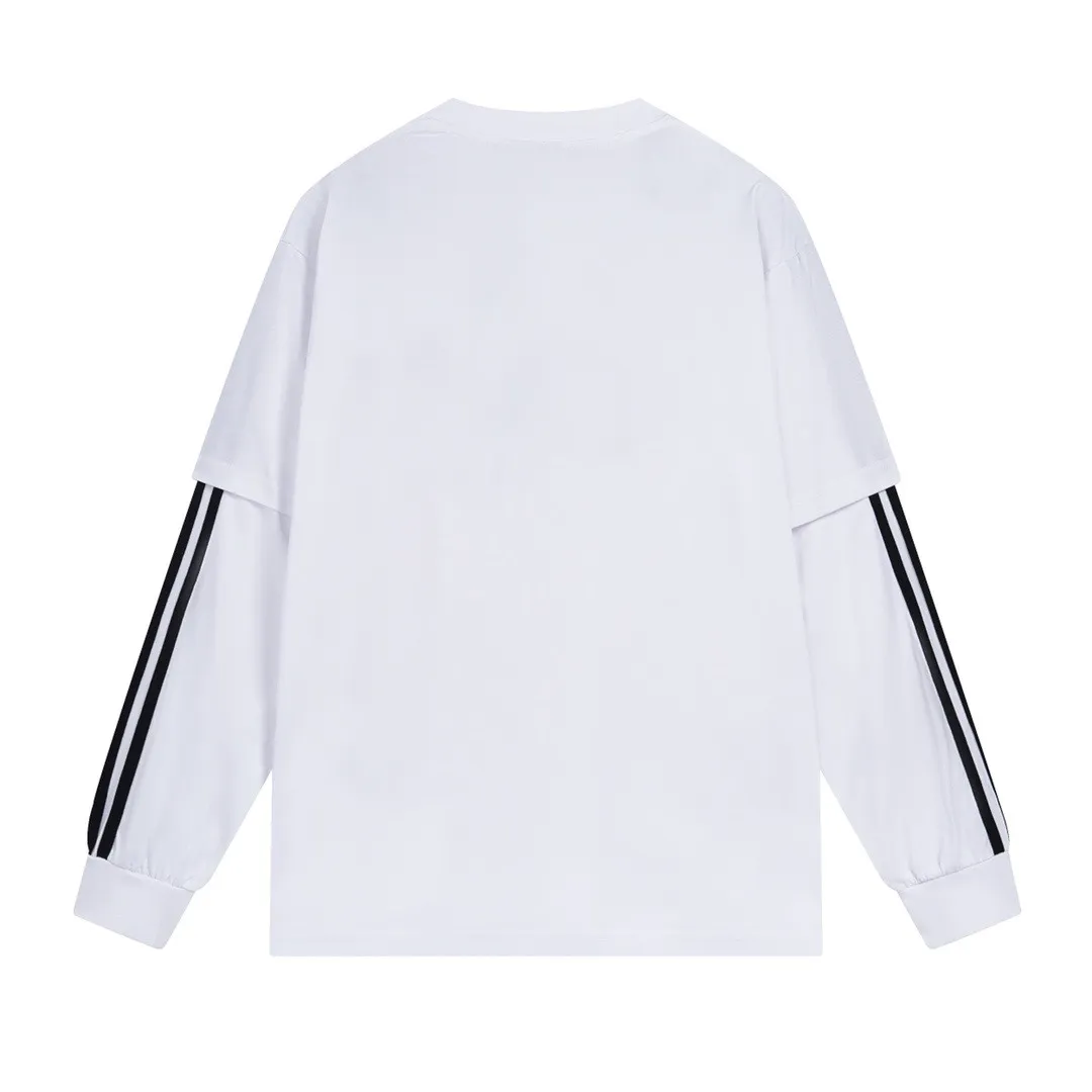 🅿️226 Detailed picture [Top version. Official website quality] BALENCI*GA/Paris co-branded Adidas classic LOGO combination on the front, embroidered long-sleeved T-shirt# The fabric is made of Paris ZP custom-woven and dyed cotton double yarn. Weighing 260 grams, the cloth surface is clean. The cloth pattern is clear, soft and comfortable. The color fastness is good. It is not easy to change color. The threads are dyed with no color difference. The classic letter LOGO embroidery is embroidered using imported Tajima embroidery machine. The lines are clear and the effect is three-dimensional. Restored brick cabinets. The version adopts OS loose shoulder design. Same style for men and women. Code: BL225030 Color: white, black Size: XS S M L