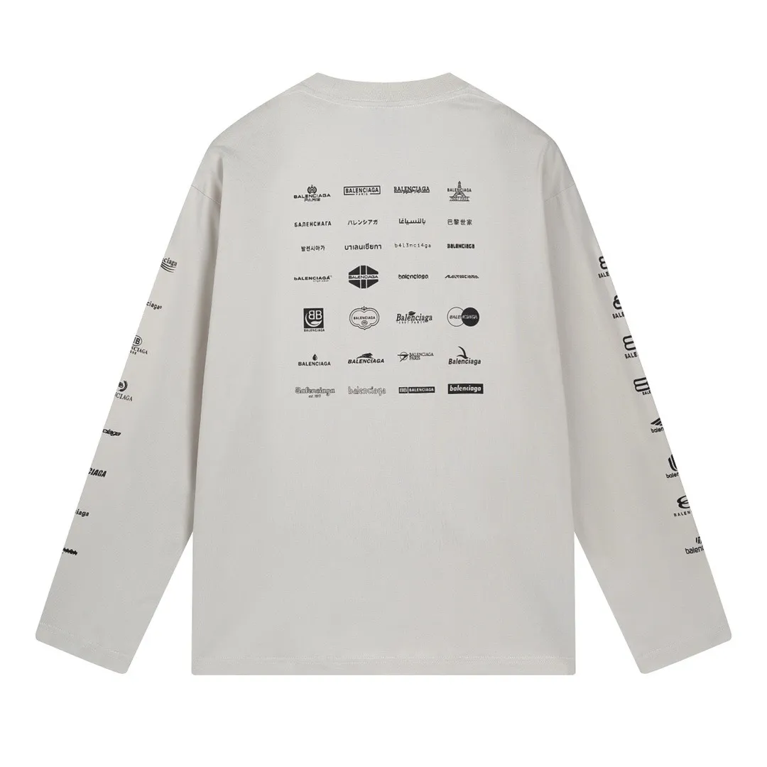 🅿️200 real photos [Top version. Official website quality] BALENCI*GA/Paris BALENCI*GA# 2024 spring and summer new style, printed with classic LOGO collection long-sleeved T-shirt. 2024 spring and summer new product. Brick cabinet synchronization. Welcome to compare. The fabric is made of Paris ZP custom-woven and dyed 100% cotton double yarn compact cotton. The weight is 260 grams, the cloth surface is clean, the cloth texture is clear, soft and comfortable. The color fastness is good. It is not easy to change color. The threads are woven and dyed with no color difference. The printing uses imported environmentally friendly rubber paddles, precision stencils, fine LOGO letters, clear letters, no burrs, and a three-dimensional effect. Restore brick cabinet. The version adopts OS loose shoulder style. Same style for men and women. Code: BL225005 Color: black, beige, pink, smoky gray, white Size: XS S M L