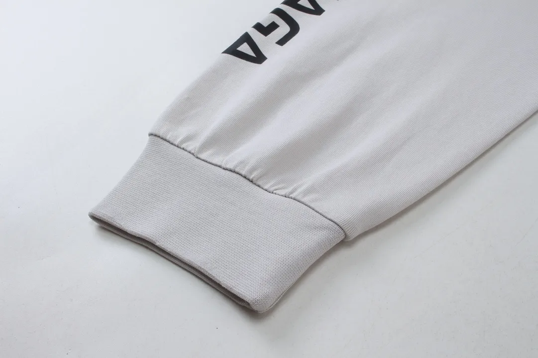 🅿️250 BALENCI*GA Paris surfing pattern long sleeves with letters. The fabric is made of Paris custom-woven double yarn cotton fabric. The weight is 280g. The thread is custom-woven and dyed without color difference. The front and back panels are made of environmentally friendly dot offset printing. Two high-temperature setting washes. os dropped shoulders and loose version. Same style for men and women -Color: gray blue beige -SIZE: XS S M L Style No. 8611#