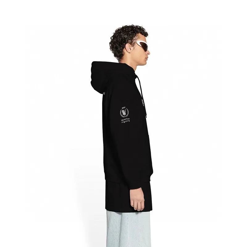 ♻️💯Reference model picture for the upper body❤️Top tested Balenciaga Balenciaga 22SS new WFP World Food Agency male and female couple star same style autumn and winter pure cotton hooded sweatshirt. The fabric is made of 480 grams of pure cotton terry material. It does not pill. It feels very good. Printed and dressed up dozens of times to achieve a 1:1 effect. They all use slurry imported from abroad. A proportion of foaming powder is added to the slurry to foam at high temperature. The printing embossing effect is very good, and the powder does not fall off or break. The front and rear panels are washable and environmentally friendly. The entire printing process takes a long time. The hem and cuffs are all customized threads. There is no error in dyeing in the same vat. The workmanship is perfect. The accessories are all customized. This year’s market hot trend has many Internet celebrities. The top is very trendy. The same style for men and women. OverSzie version. Color: Black White Size: XS-L P:450
