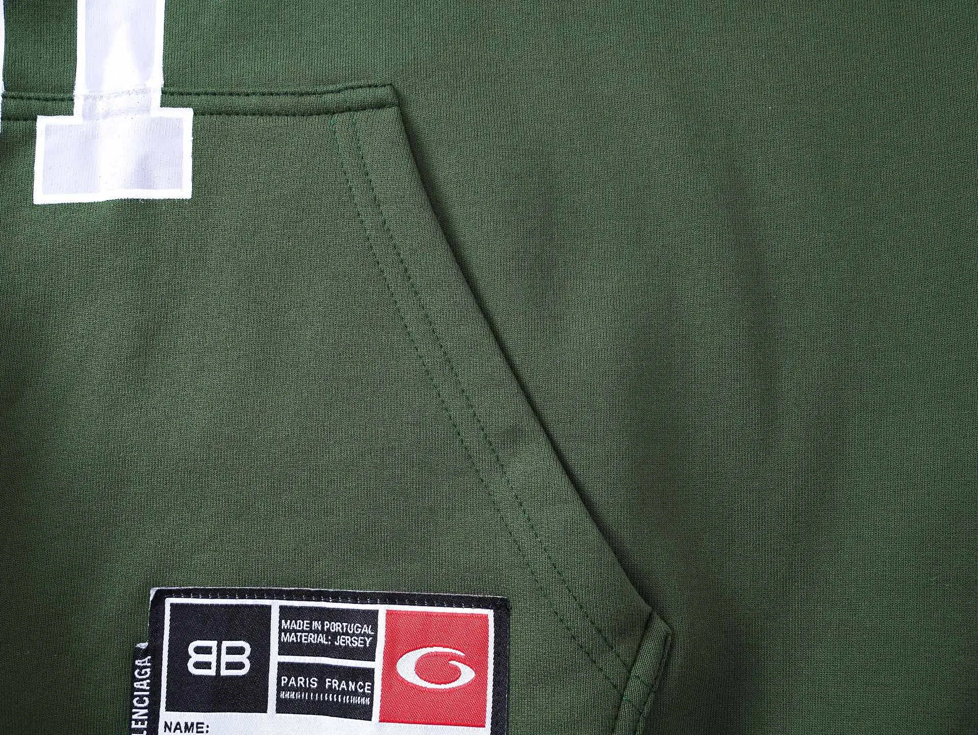 🅿️350 Actual pictures [Top version. Official website quality] BALENCI*GA/Paris.SS25 latest basketball uniform embroidered printed hooded long-sleeved sweatshirt. The front embroidery is embroidered and printed using a Tajima computer embroidery machine, the lower left corner is stamped, and the back piece is printed. The brick cabinets are synchronized. The authentic product is developed at the first time. The fabric is made of Paris ZP custom-woven and dyed cotton sweatshirt. Weighing 460 grams, the cloth surface is clean. The cloth pattern is clear, soft and comfortable. The threads are dyed with no color difference. The printing uses environmentally friendly imported materials, the letters are clear and the effect is three-dimensional. The version adopts OS loose shoulder design. Same style for men and women. Code: BL258959 Color: Black Purple Blue Green Size: XS S M L