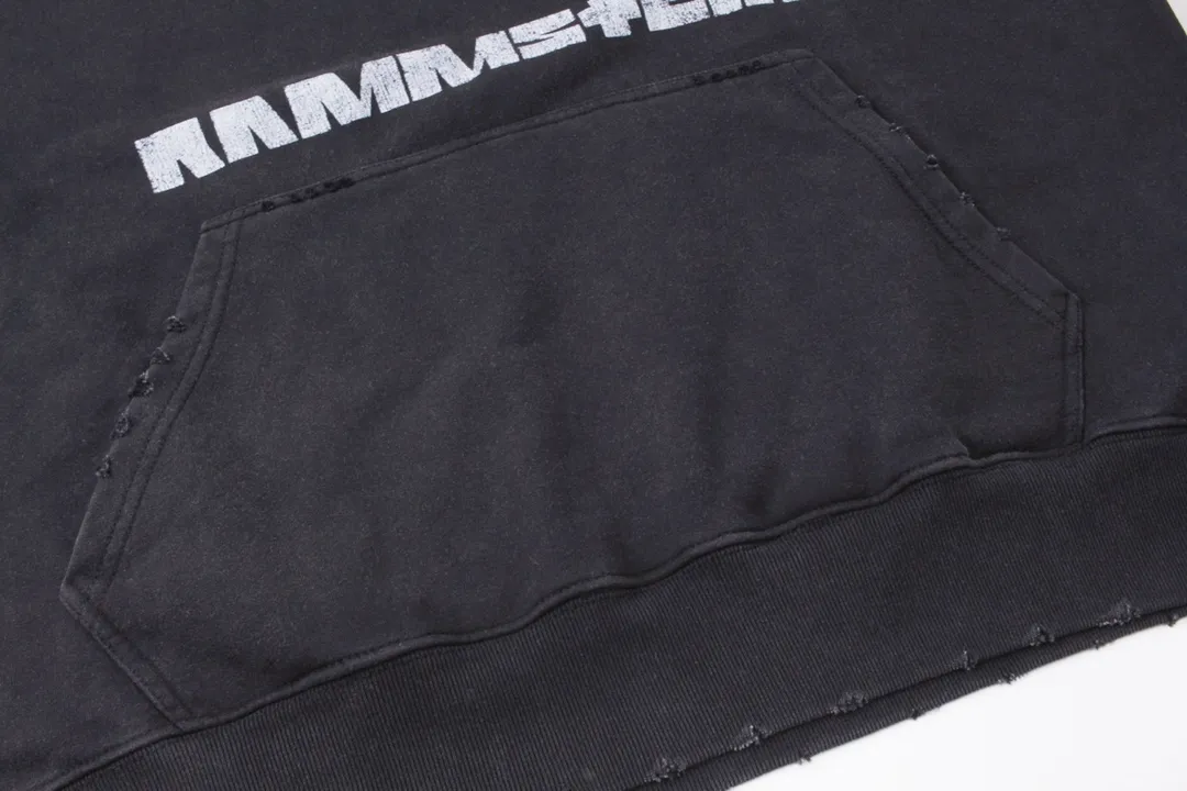 🅿️330 Detailed picture [Top version. Official website quality] BALENCI*GA/Paris Rammstein band co-branded hooded sweatshirt. The fabric is made of Paris ZP custom-woven and dyed cotton sweatshirt. The net weight is 450 grams. The cloth surface is clean. The cloth pattern is clear, soft and comfortable. The threads are dyed with no color difference. The pattern adopts Kornit digital direct printing machine, the letter strips are drawn with crack technology, the direct printing color is aligned with the original color, the LOGO is embroidered on the back of the clothes and legs, the ready-made clothes are washed and worn, the brick cabinets are restored, and the Jubie market is produced according to the pictures. You are welcome to compare the version and adopt the OS loose shoulder version. Same style for men and women Code: BL238070 Color: Washed black Size: XS S M L
