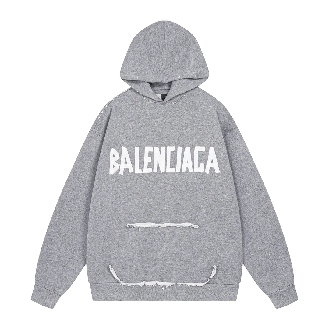 🅿️400 real photos. Note: Floral gray ❗️ [Top version. Official website quality] BALENCI*GA/Paris. 23ss latest classic hot style. Purchase the original board at the first time. Color. Printing. Washing. Production can be traced back to the original product. Wrong version in the market. Welcome to compare. Tape direct printing. Ready-to-wear hooded sweatshirt washed and worn twice. The brick cabinet is synchronized. The fabric is made of Paris ZP custom-woven and dyed cotton sweatshirt. The weight is 450 grams. The cloth surface is clean. The cloth pattern is clear, soft and comfortable, and the threads are dyed with no color difference. The classic pattern adopts Kornit imported direct injection. The letters are clear and the effect is three-dimensional. Restored brick cabinet. The garments were washed and aged, and polished by many hands. Produced by ultra-heavy craftsmanship, special market currency. Note⚠️ZP fabric is made of fine-grained yarn. Pay attention to the big difference! Welcome to compare! The version adopts OS loose shoulder version. The same style for men and women. Code: BL238016 Color: dark gray blue, Paris blue, washed black, burgundy, fluorescent yellow, green, floral gray, sky blue, khaki Size: XS S M L