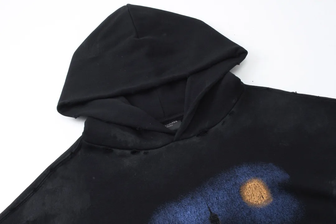 🅿️380 real shots [Top version. Official website quality] BALENCI*GA/Paris. 2024 latest Paris Eiffel Tower inkjet graffiti hand-painted gradient color print washed distressed hooded sweatshirt. Overweight craftsmanship, brick cabinet synchronization. ⚠️Distinguish the market currency, genuine development, this style is black enzyme wash. It is not the market wrong wash water black. The weight is 450 grams, worn. The hand-painted is consistent with ZP, and the printing uses Kornit digital direct printing. The garments are washed, worn and worn. Graffiti are hand-painted. The whole piece is designed with extra heavy craftsmanship. Comparisons welcome. The version adopts OS loose shoulder design. Same style for men and women. Code: BL238012 Color: Black Size: XS S M L