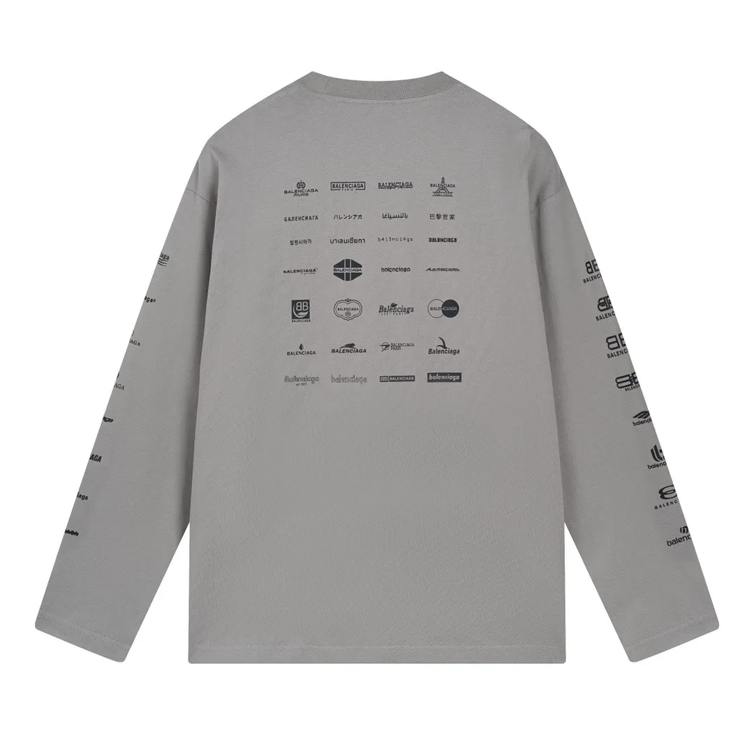 🅿️200 real photos [Top version. Official website quality] BALENCI*GA/Paris BALENCI*GA# 2024 spring and summer new style, printed with classic LOGO collection long-sleeved T-shirt. 2024 spring and summer new product. Brick cabinet synchronization. Welcome to compare. The fabric is made of Paris ZP custom-woven and dyed 100% cotton double yarn compact cotton. The weight is 260 grams, the cloth surface is clean, the cloth texture is clear, soft and comfortable. The color fastness is good. It is not easy to change color. The threads are woven and dyed with no color difference. The printing uses imported environmentally friendly rubber paddles, precision stencils, fine LOGO letters, clear letters, no burrs, and a three-dimensional effect. Restore brick cabinet. The version adopts OS loose shoulder style. Same style for men and women. Code: BL225005 Color: black, beige, pink, smoky gray, white Size: XS S M L