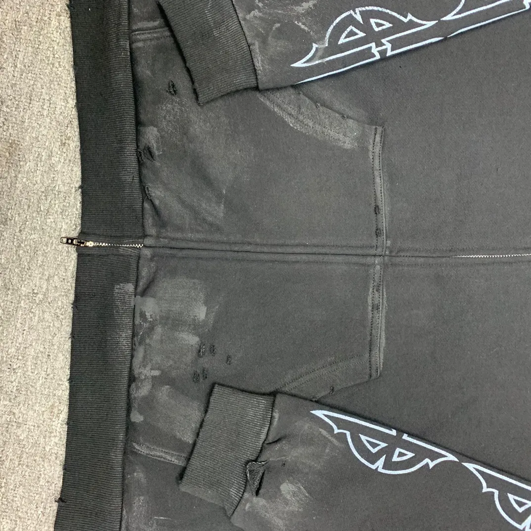 Details added————The top tested version BALENCIAGA Tower Paris Night Balenciaga distressed and dirty hole washed hooded zipper hoodie sweatshirt YB1.3W purchase ➕ price 10K purchase original directional development! 460g double-ply double-yarn terry fabric, the garment weight is as high as 1.2kg! The back printing adopts Kornit digital direct printing process, and the shipment is extremely slow! Especially the Yunmu color on the tower is very delicate and grainy! The overall bursting letters are very evenly distressed and have a full sense of distress! The whole body was severely damaged, all randomly worn by hand! Very time consuming! The whole piece of clothing went through three washes. The fabric was first pre-shrunk, and then washed with distressing water to wash out the color on the printed surface to give it a distressed look. After washing with water for the second time, do the dirty coating. The staining is also a manual process, and each position of the coating must be brushed more than 3 times before! The key point is the coating on the back. It is a process that really makes people vomit blood. It has to be brushed back and forth, more than 20 times, to evenly apply the coating! It can be said that it will never be seen alive. After the coating is completed, the garments will be sprayed and then washed with wax! After washing with the wax, the fabric feels smooth and won't have that harsh, rough feel! This is also a key craft! If this step is missing, it won’t be visible on the screen, but it will be very uncomfortable and the skin texture will be very poor!  The workmanship is troublesome, and it normally takes 15 days for orders to be returned! Look at this construction period and this price, do you think it’s worth it?  Size: XS-L Color: Active Black P:490