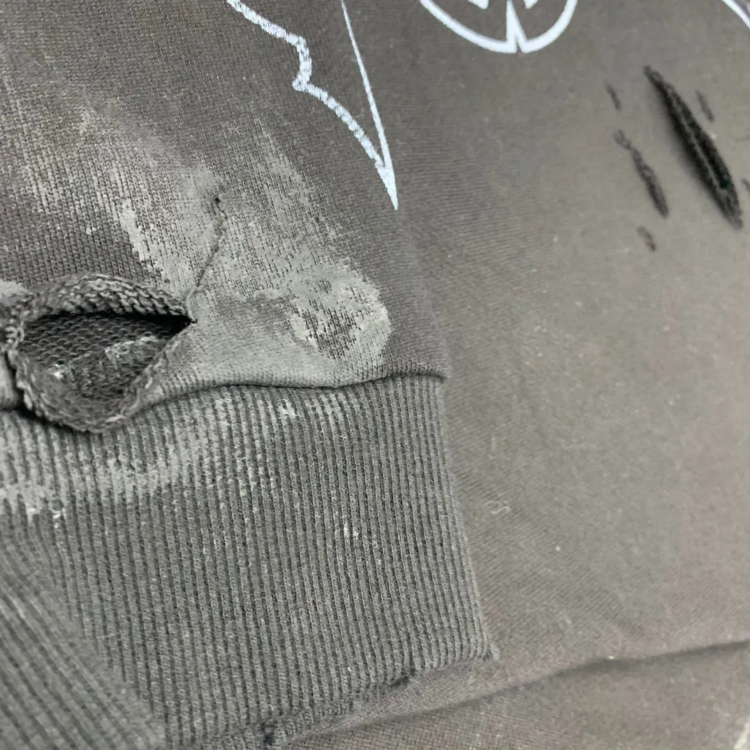 Details added————The top tested version BALENCIAGA Tower Paris Night Balenciaga distressed and dirty hole washed hooded sweatshirt YB1.3W purchase ➕ price 10K purchase original directional development! 460g double-ply double-yarn terry fabric, the garment weight is as high as 1.2kg! The back printing adopts Kornit digital direct printing process, and the shipment is extremely slow! Especially the Yunmu color on the tower is very delicate and grainy! The overall bursting letters are very evenly distressed and have a full sense of distress! The whole body was severely damaged, all randomly worn by hand! Very time consuming! The whole piece of clothing went through three washes. The fabric was first pre-shrunk, and then washed with distressing water to wash out the color on the printed surface to give it a distressed look. After washing with water for the second time, do the dirty coating. The staining is also a manual process, and each position of the coating must be brushed more than 3 times before! The key point is the coating on the back. It is a process that really makes people vomit blood. It has to be brushed back and forth, more than 20 times, to evenly apply the coating! It can be said that it will never be seen alive. After the coating is completed, the garments will be sprayed and then washed with wax! After washing with the wax, the fabric feels smooth and won't have that harsh, rough feel! This is also a key craft! If this step is missing, it won’t be visible on the screen, but it will be very uncomfortable and the skin texture will be very poor!  The workmanship is troublesome, and it normally takes 15 days for orders to be returned! Look at this construction period and this price, do you think it’s worth it?  Size: XS-L Color: Active Black P:470