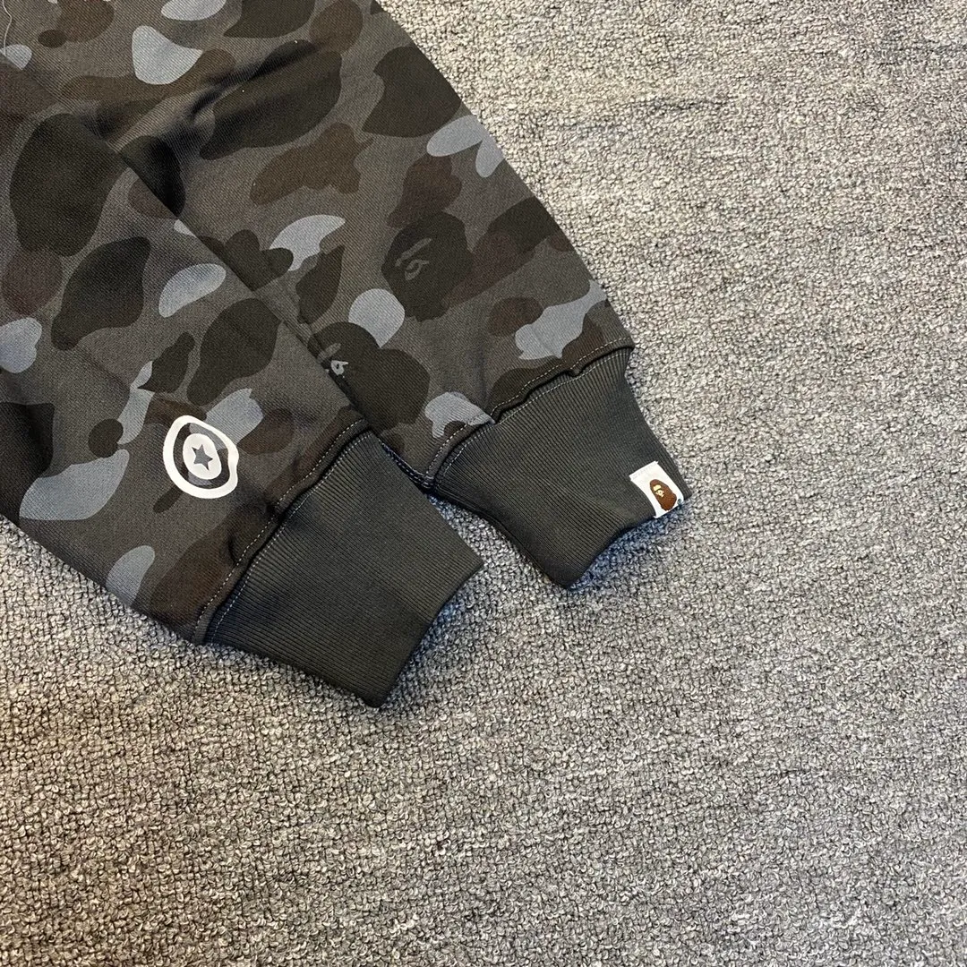 💰380 BAPE 1ST CAMO SHARK FULL Classic counter model Camouflage shark hooded zipper sweatshirt Machine-printed camouflage Top-quality fabric High-end 1:1 replica Customized fabric Couple model: S—XXL [Camouflage yellow, Camouflage green, Camouflage red, Camouflage purple, Camouflage blue, Camouflage gray]
