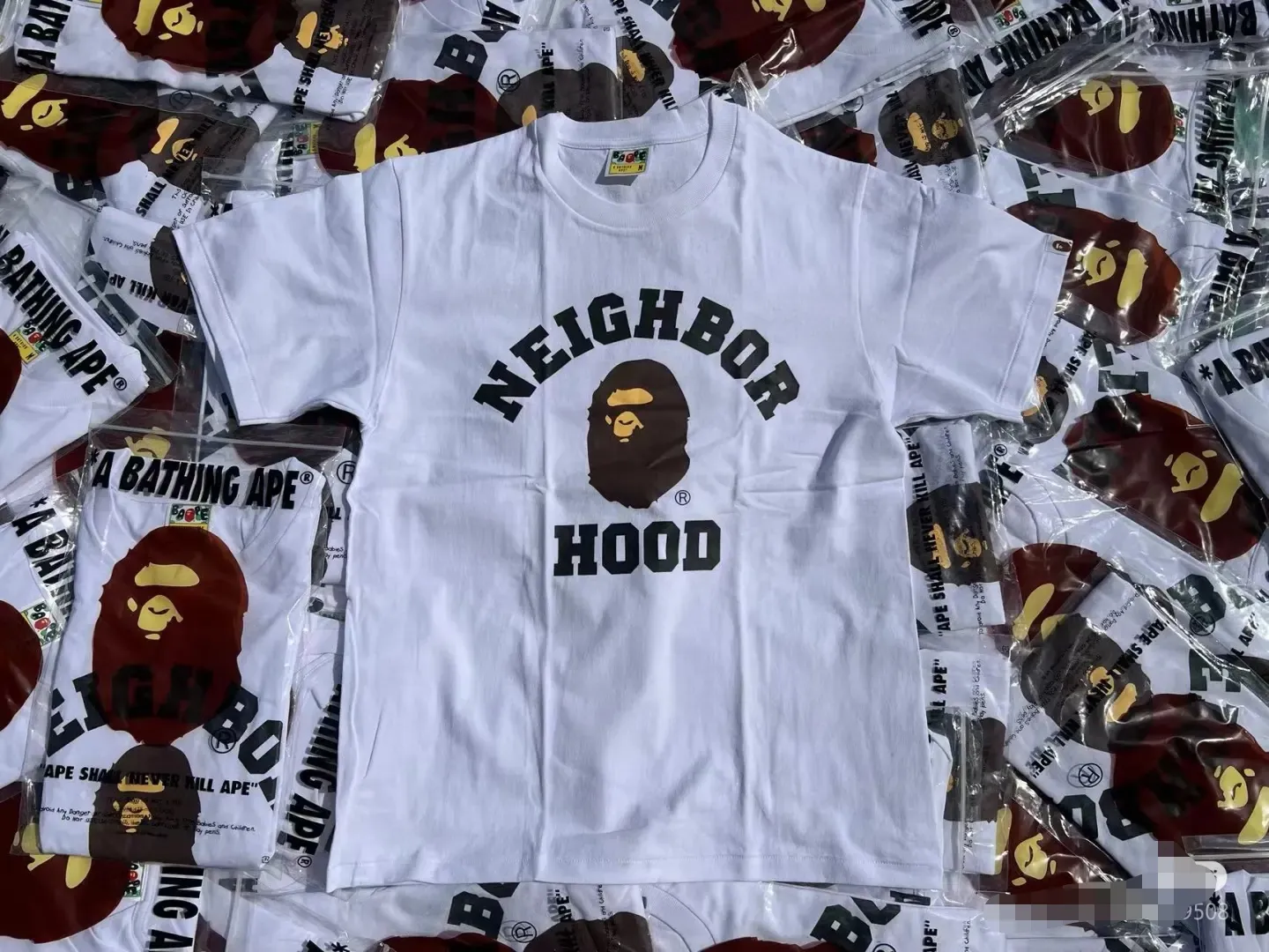 P110 001039 A BATHING APE BAPE x NBHD joint model SS23 American retro logo letter printing loose round neck short-sleeved T-shirt, same style for men and women, size smlxlxxl, black and white
