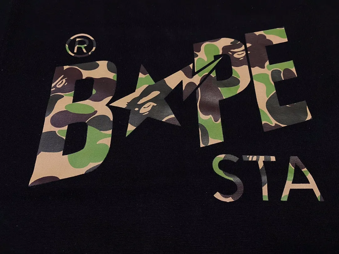 SC116#p110💰 (top version) BAPE camouflage star letter printed short-sleeved T-shirt Made of 260 grams of high-quality high-weave pure cotton fabric, double yarn combed, soft texture and no pilling Imported environmentally friendly printing glue, bright and three-dimensional pattern, quality 💥Same style for men and women, the upper body is fashionable Color: black white Size: S M L XL XXL