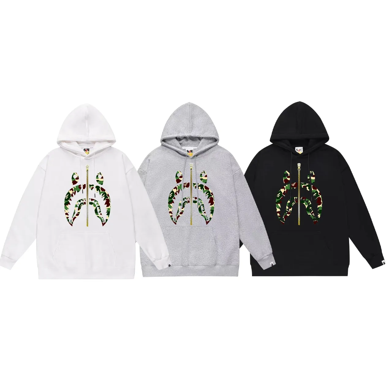 Model number SC689#terry p160 plus velvet p180💰 (top version) BAPE camouflage shark zipper printed hooded sweatshirt Made of 380g large terry 430g silver fox velvet (drop shoulder large version) fabric, soft and non-pilling, imported environmentally friendly printing glue, bright and three-dimensional pattern, quality 💥Same style for men and women, the upper body is trendy. Color: black and red, white and red, gray and red, black and green, white and green, gray and green. Black and blue, white and blue, gray and blue Size: S M L XL XXL