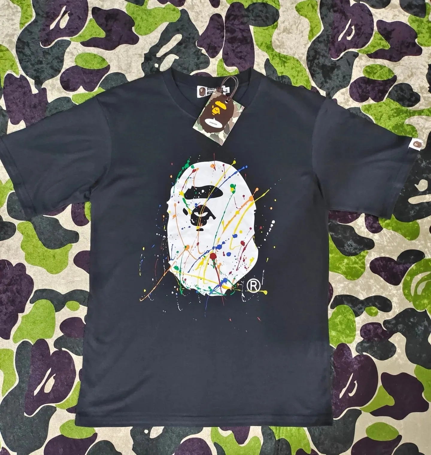 P110 001088 BAPE Paint Splatter Ape Head Oversized Tee paint splash graffiti ape print round neck pullover loose short-sleeved T-shirt same style for men and women code number smlxlxxl black white