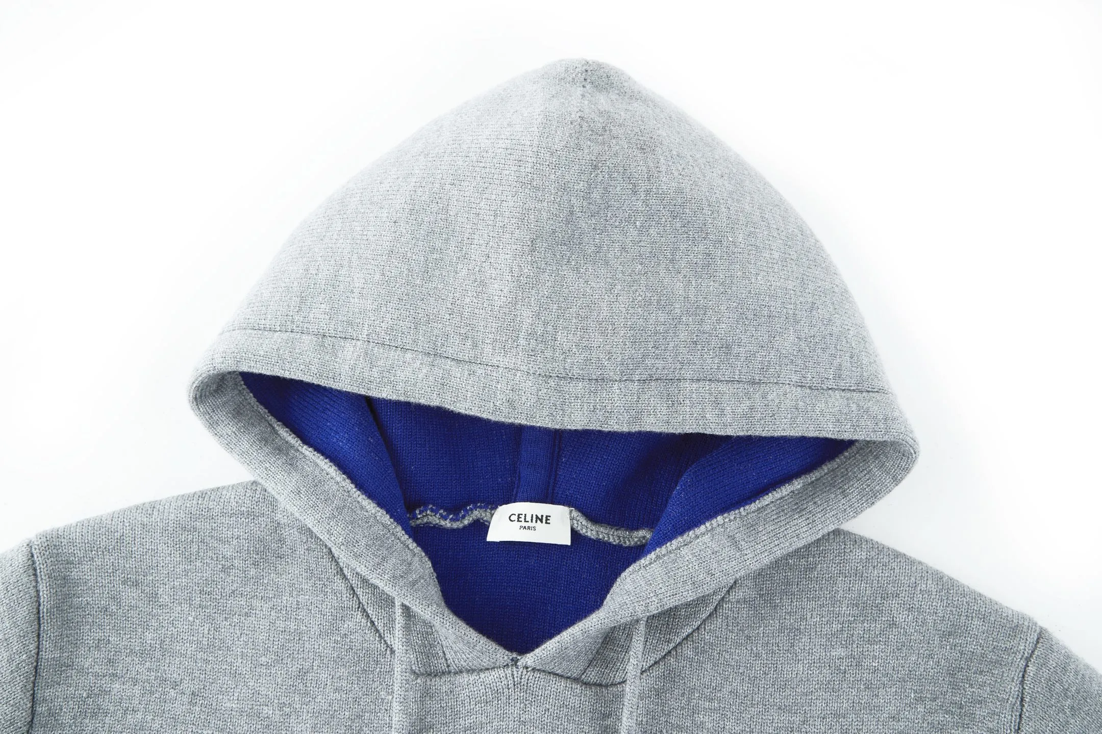 🅿️520 Celine Arc de Triomphe jacquard hooded sweater (grey). The original version was purchased and developed for 16,550 yuan. The fabric is made of 50% wool, 10% cashmere, and 40% cotton. This fabric is originally stitched, dyed and woven. The weight of ready-made garments is about 920-960 grams. The thermal effect and upper body effect are perfect. Using the 7-needle jacquard process, a single piece of clothing takes 320 minutes to complete. The rope is custom-woven and dyed, the tail clip is made from the original mold, and the brand logo is laser-engraved on the surface. TRIOMPHE embroidered loose fit, hood with adjustable drawstring, metal hoop engraved with CELINE PARIS, 1 kangaroo pocket with ribbed trim. Size:S-M-L-XL