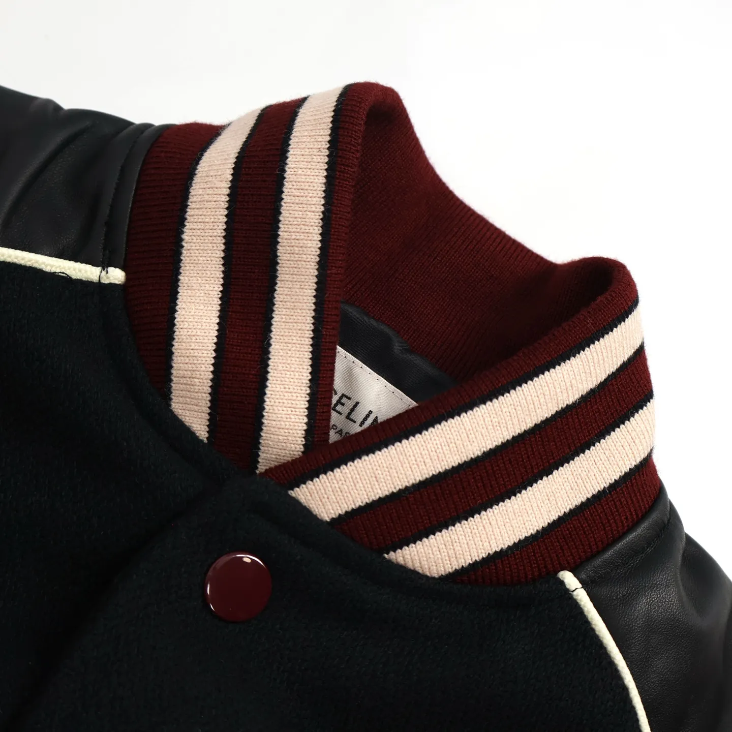 🅿️1160 [Exclusive supply] Celine wool sheepskin baseball jacket. The main body fabric is made of 90% pure wool woolen solid color processing. Wool threads are made on a flat machine. The sides of the shoulders are made of pure sheepskin dyed black and cut by hand. The sleeves are made of imported uncoated cotton sheepskin, and the two Cs on the front and back are embroidered with high-density seals. The color is consistent with the body leather. Silk lining Comes standard with dust bag. Size:46-48-50-52