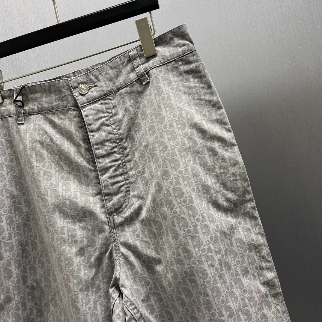 🅿️510 🧧CD Gray Cotton Denim Oblique Print Pants These work jeans display Oblique print, reinterpreting workwear style with a casual cut. Crafted from gray cotton denim and finished with classic . Blique print for an elegant look. Pair with the matching village shirt for a graphic look.
