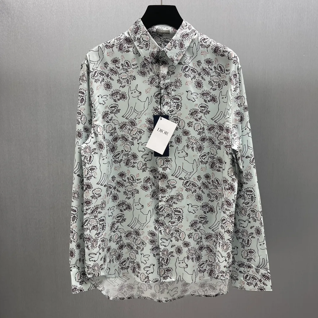 🅿️460 🧧CD Fantasy Cute Pet Printed Shirt Size: S-XL This village shirt comes from the DIOR AND HYLTON NEL joint series, showing an interpretation of the artist's work. Crafted from green mulberry silk twill fabric, it features a classic cut and a hidden button fastening. The style is fashionable and can be paired with other pieces from the limited series.