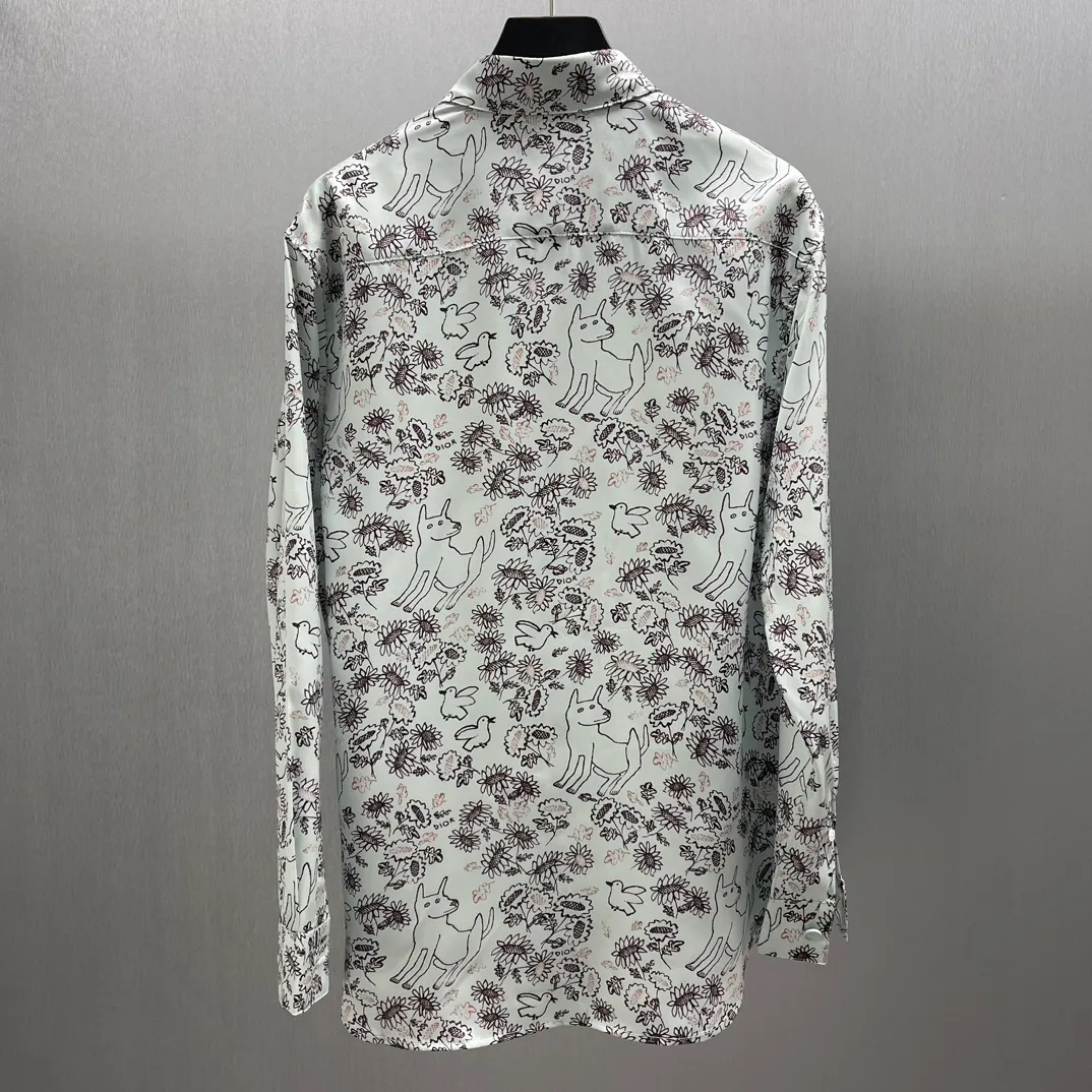 🅿️460 🧧CD Fantasy Cute Pet Printed Shirt Size: S-XL This village shirt comes from the DIOR AND HYLTON NEL joint series, showing an interpretation of the artist's work. Crafted from green mulberry silk twill fabric, it features a classic cut and a hidden button fastening. The style is fashionable and can be paired with other pieces from the limited series.