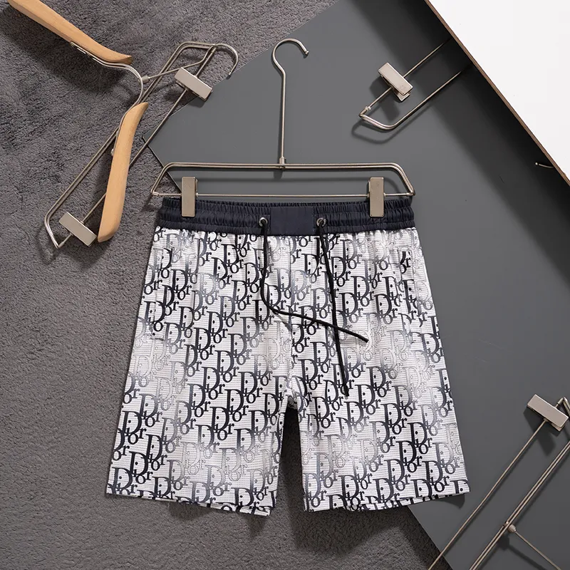 🅿️130 #V2516 [Restock all year round] Dior 2025 latest style shorts and beach pants, a must-have for beach travel, high-order original hardware! The upper body effect is super positive, and the leg lines are fully highlighted. The texture of imported quick-drying fabrics is tight and delicate, and the panoramic high-definition logo design makes the upper body very comfortable and stylish. It is also extremely practical and versatile. It is worth buying! Color: White Size: M L XL XXL 3XL