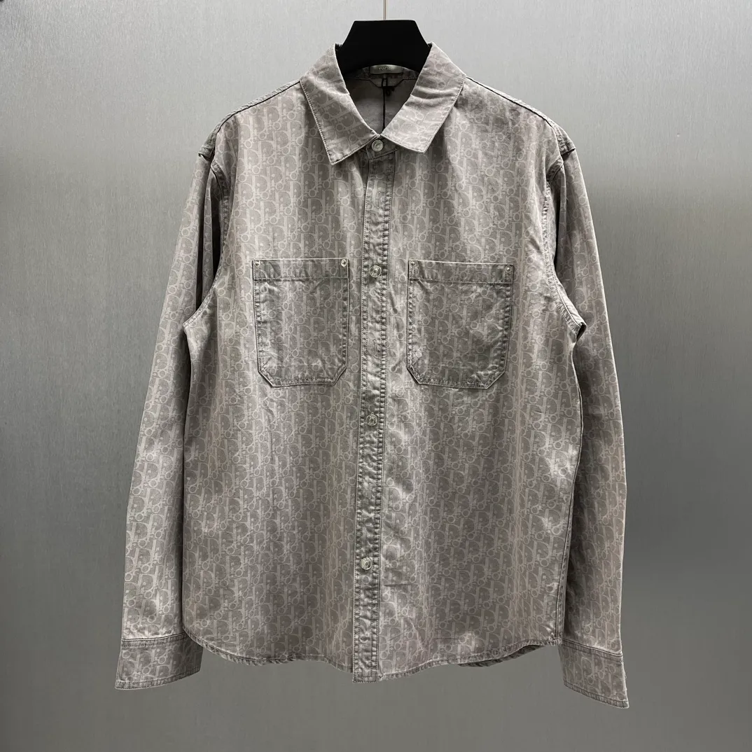 🅿️530 🧧CD gray cotton denim Oblique print jacket shirt Size: S-XL This jacket shirt is decorated with Oblique print all over, a new interpretation of Dior's classic pattern. Crafted from gray cotton denim, it features a patch pocket on the chest and buttons with Dior signature. The unique minimalist design pairs well with sportswear or a more classic look.