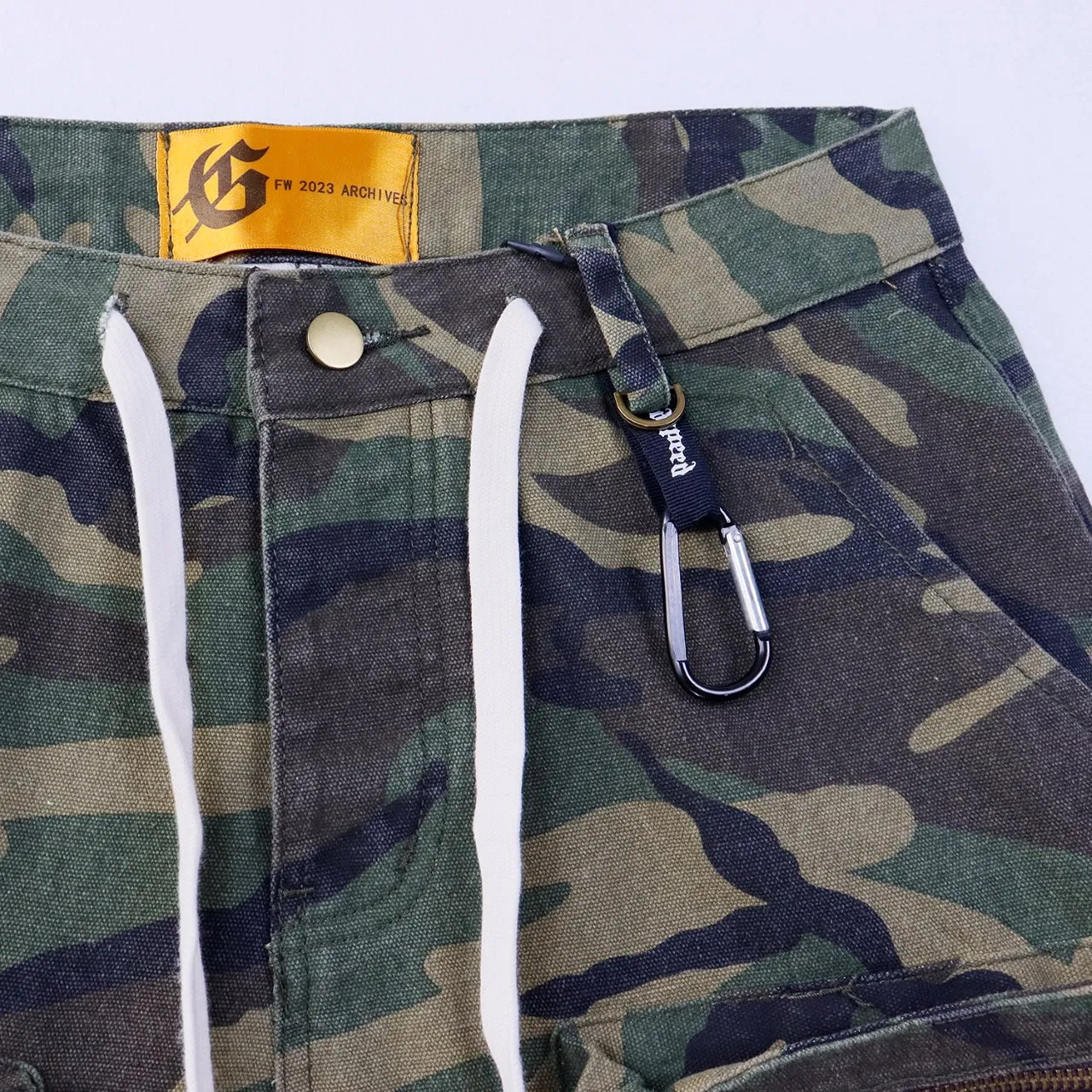 Style No.: 8667 P180 Fabric: Work Jeans Real-stock Godspeed Army Green Camouflage Work Pants Denim Shorts, Loose Fashion Brand Denim Color: Camouflage Green Size 28 (S) 30 (M) 32 (L) 34 (XL) 36 (XXL) 38 (XXXL)