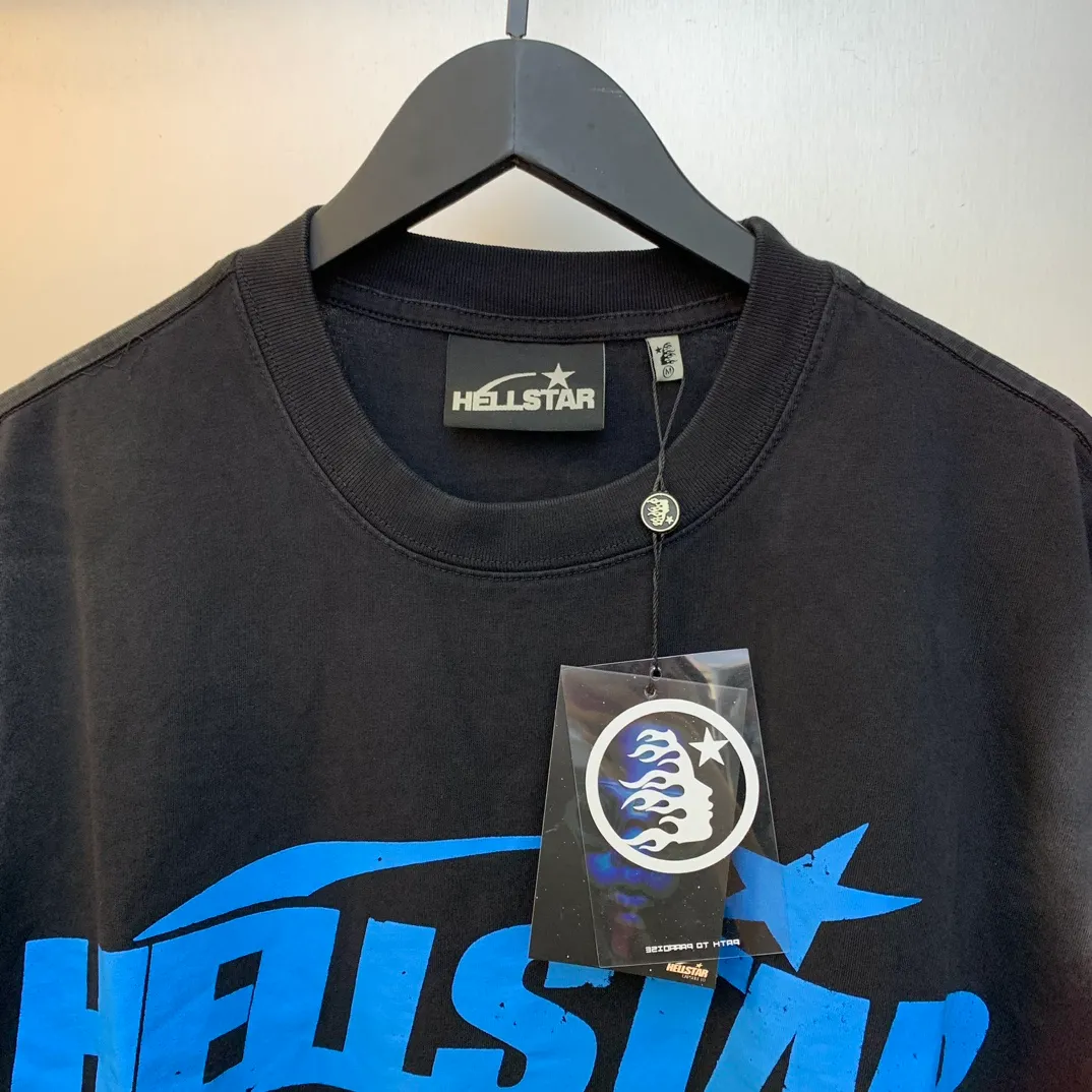 P126 Hellstar Studios Classic Blue Logo Short Sleeve Tee Shirt Washed Black Short Sleeve T-shirt The new hot beauty trend Hellstar!  Standard beauty and trendy workmanship, original customization (fabric, pattern, printing, hang tag, main mark, etc.), exaggerated style, explosive style, dare to break through tradition, bring adventurous new fashion experience!   YoungBoy, the most popular rapper in the youth circle, has shot a lot of models for him, and celebrities such as Dababy and Swae Lee frequently get dressed!  color: black Size: S, M, L, XL