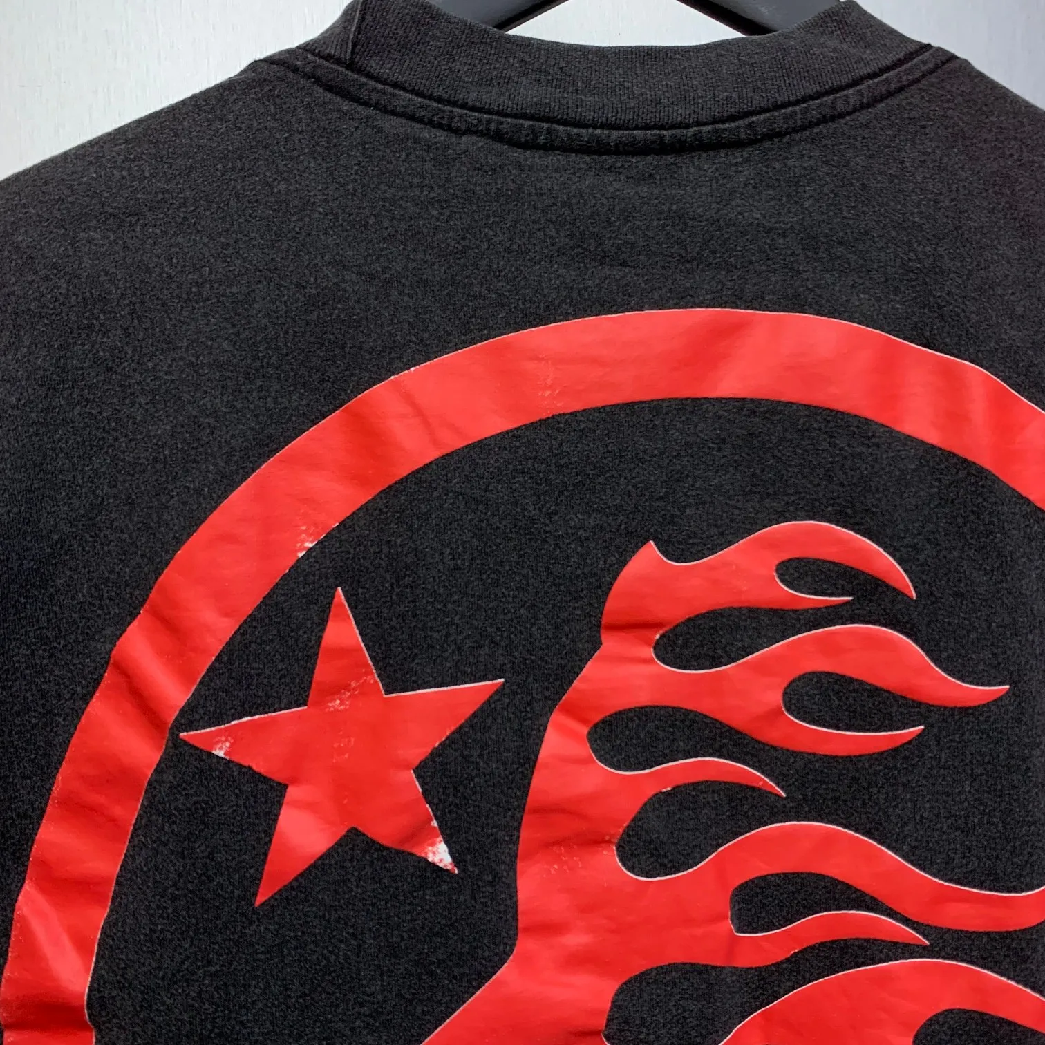 P126 Custom Cut and sew garment in Los Angeles. Dyed and potassium sprayed with jumbo screen print. Fits slightly oversized. Gentle wash tumble dry. Dry clean preferred Newly popular Hellstar short-sleeved T-shirt!  Standard beauty and trendy workmanship, original customization (fabric, pattern, printing, hang tag, main mark, etc.), exaggerated style, explosive style, dare to break through tradition, bring adventurous new fashion experience!  YoungBoy, the most popular rapper in the youth circle, has shot a lot of models for him, and celebrities such as Dababy and Swae Lee frequently get dressed!  color: Vintage Black (washed black)