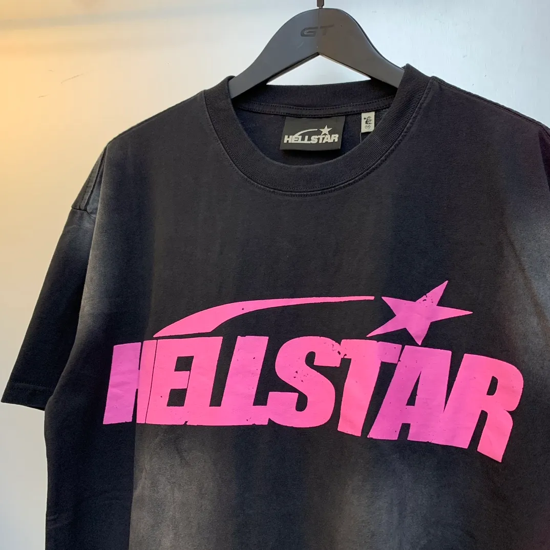 P126 Hellstar Studios Classic Pink Logo Short Sleeve Tee Shirt Washed Black short-sleeved T-shirt is a new hot trend in Hellstar!  Standard beauty and trendy workmanship, original customization (fabric, pattern, printing, hang tag, main mark, etc.), exaggerated style, explosive style, dare to break through tradition, bring adventurous new fashion experience!   YoungBoy, the most popular rapper in the youth circle, has shot a lot of models for him, and celebrities such as Dababy and Swae Lee frequently get dressed!  color: black Size: S, M, L, XL