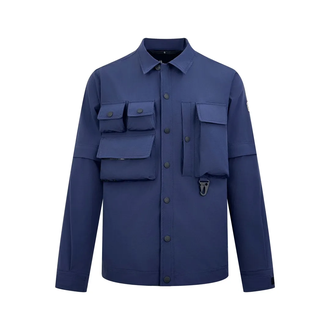 P610 Moncler Grenoble functional outdoor jacket Custom dyed double stretch mercerized poplin Custom dyed soft mesh pongee Excellent texture Comfortable and close to the skin Navy blue inspired by the deep sea Low-key statement of the contemporary gentleman Precision narrative of functional pocket system Balance of function and aesthetics The iconic Moncler logo appears on the sleeves for full recognition The triangular logo of the same color is hidden into the fabric texture like a mark in the undercurrent of the deep sea, extremely invisible and visible The detachable sleeve design allows for diversified outfits The style can be switched freely, chic and noble, taking into account the balance between outdoor practicality and urban aesthetics, leading the fashion. Process 1: Using three-in-one process, the glue is evenly coated on the surface of the substrate that needs to be composited, and then dried and solidified. Then the substrate coated with the adhesive film is laminated with the non-woven fabric, and then cooled and solidified, and then composited with the filter non-woven fabric. The workmanship is cumbersome and complex, time-consuming and labor-intensive. Process 2: Embossed composite technology through computer scanning. Ensure that the size and shape of the imprint are consistent with the original, then use special glue as an adhesive to combine and then solidify to achieve complete dryness and the best bonding effect. Process 3: Use CNC laser burning and cutting. Based on the high-energy characteristics of the laser, the moving path of the laser beam is precisely controlled by the laser generator to achieve precise cutting of the shape. Process 4: Template machine bag opening. The preset template guides the position, shape and size of the bag opening. The accuracy ensures the quality of the bag opening effect. Process 5: Uses infrared special machine to tack buttons. The position is more precise and firm. Accessories: Customized 1:1 Moncler snap button Customized 1:1 Moncler resin buckle Customized 1:1 Moncler logo stamp Customized 1:1 Moncler logo armband Customized 1:1 Moncler zipper rope ring Customized 1:1 Moncler zipper pull Customized 1:1 Moncler trademark Version: Loose version Function: Detachable sleeve splicing Style can be switched at will Size: 1 2 3 4