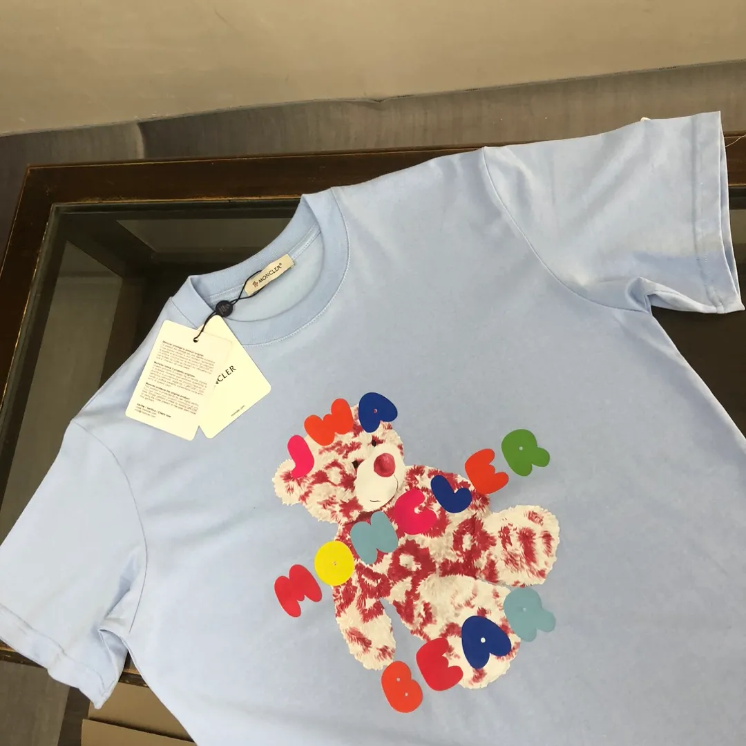 P160 MONCLER 25 The latest short-sleeved T-shirt for couples~Colorful bear element print~The upper body of the fabric is comfortable and breathable, not stiff, slim cut, made of high-customized pure cotton fabric! The upper body is comfortable and stylish, and it can be worn alone as an inner layer. It is a must-have for fashionistas! ! ! Color: Black White Orange Sky Blue Size: S M L XL (Loose fit! Please state your height and weight when placing an order)