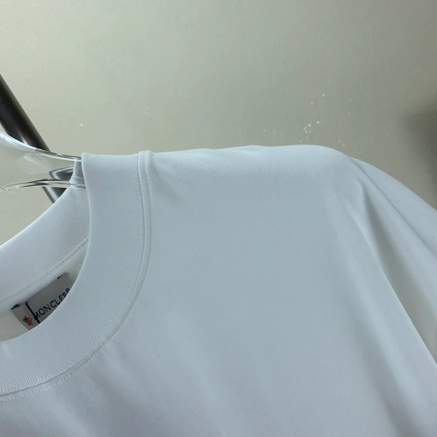 P170 MONCLER 2025 spring and summer new model, trendy hollow patch embroidery, round neck short-sleeved T-shirt, fashionable men and women, S M L XL XXL five sizes black white