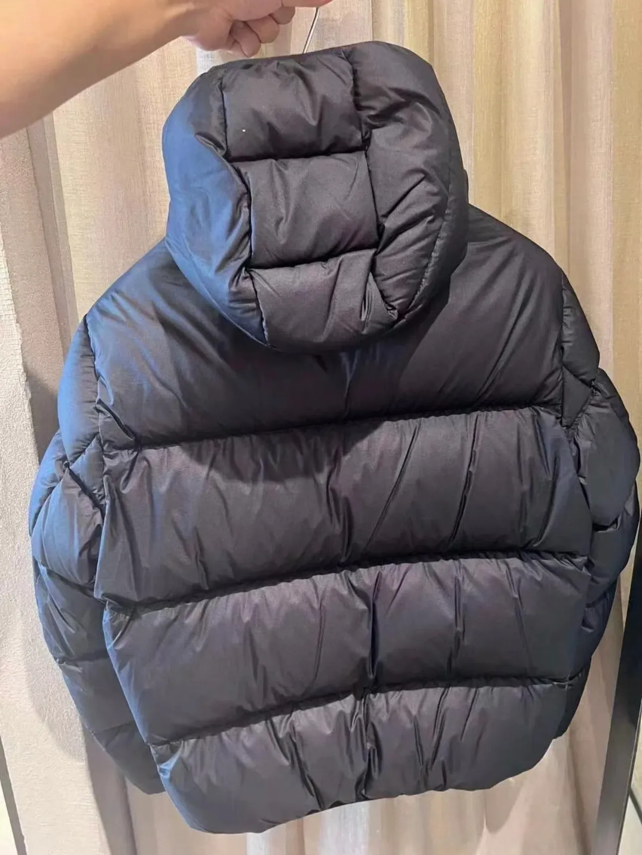 P900 Moncler Masac men's short down jacket. Real shot display at the counter.