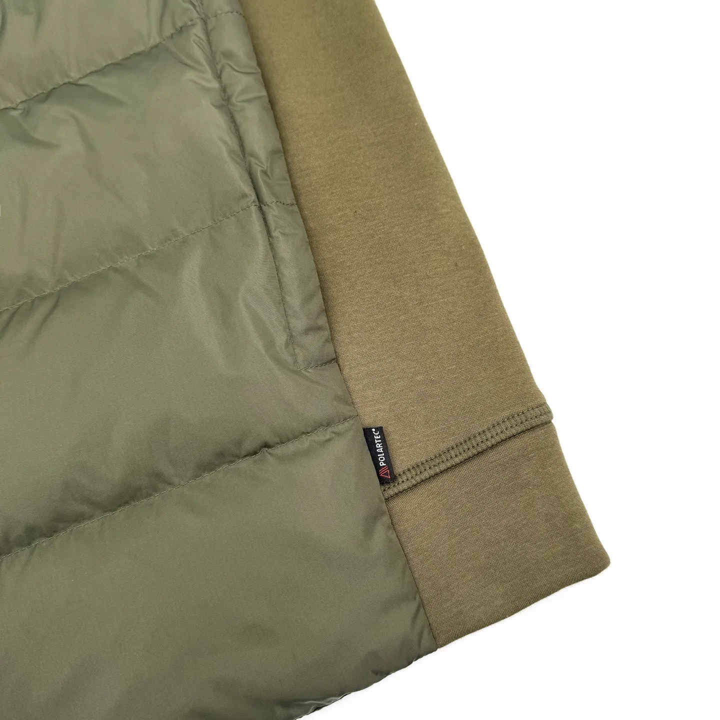 P780 Moncler logo woven splicing down jacket (green). The fabric is made of customized matte lattice air shield velvet and 300D high-density calendered coating. It uses the new national standard 90 white duck down (welcome to test). It has a full amount of down and is warm. It is light and fluffy. It uses the dark green of the overlapping mountains as the background. Everything is accumulating. It creates its own scenery in silence. The Monlcer triangle logo is embellished on the chest. The power aesthetic of the minimalist logo. The concentrated down filling in the front panel creates dynamic insulation for the core heat dissipation zone of the human body. The hooded down is a moving warm flow barrier for the head and neck, forming a thermal energy circulation system with the front panel. The elastic woven sleeves provide freedom of movement with a sense of compression, forming a relaxed and warm philosophy. The real high-end is to let function become the footnote of style, and computer mechanical down filling is given priority by making liner paper patterns to determine the down filling area according to the original three-dimensional effect. Determine the gram weight of down per square meter according to the original three-dimensional effect, thereby calculating the filling amount of each piece. The computer down filling machine uses a digital weighing unit to achieve stable measurement and 3D three-dimensional quilting technology. With the help of the CNC quilting machine's programming system, the down in different areas is accurately separated to ensure that the filling is evenly fixed after sewing. To avoid agglomeration or shifting, the computer template machine runs the line. The computer template machine's line process shows extremely high neatness and smoothness. The craftsman accurately controls the size during the operation to ensure that each row line meets the design requirements. The lines of the entire template are smooth and uniform. Neat and beautiful, the triple overlocking and five-thread dense stitching process uses main seam overlocking + diagonal reinforcement + raw edge wrapping. The triple structure forms a three-dimensional protective net at the edge of the fabric to avoid stitch breakage. Size:S-M-L-XL