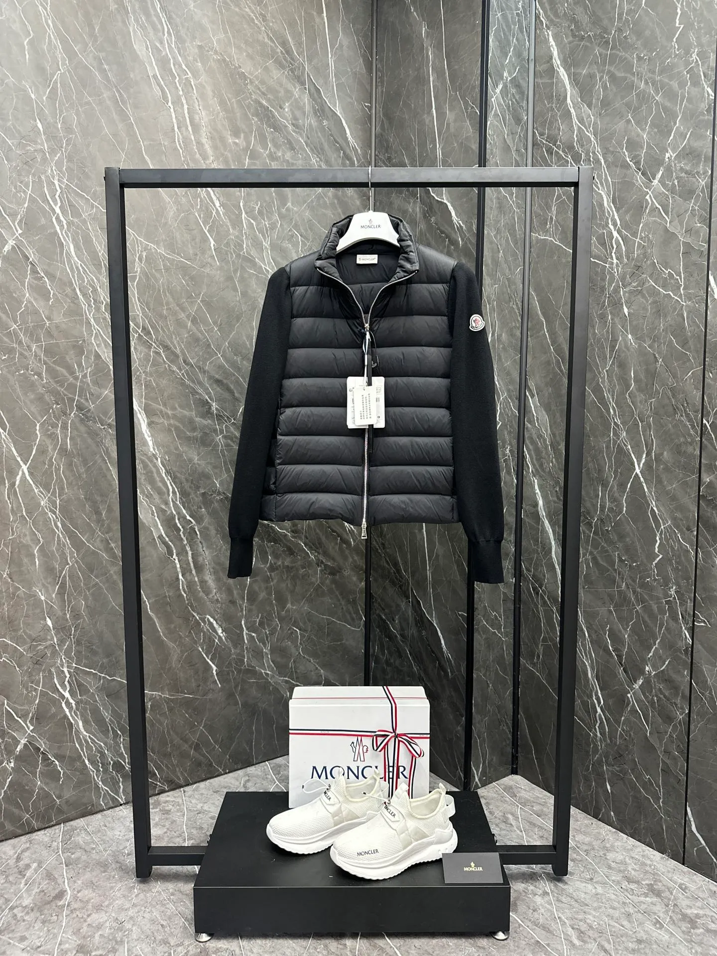P660 New in Down⬆️Moncler Cardigan Women's Lightly Padded Wool Down Cardigan Jacket. This women's wool cardigan is filled with down and is suitable for all seasons.  This cardigan is a classic Moncler design that can be worn on its own when the weather is nice, or paired with jackets and coats when the weather cools down. Wool knit style with down-filled front for warmth and protection. Details Made of fine wool and nylon léger brillant •Nylon léger brillant lining •Down filling •Jersey knit •14 gauge •Zip closure •Zip pockets Size : 1-3 Black White