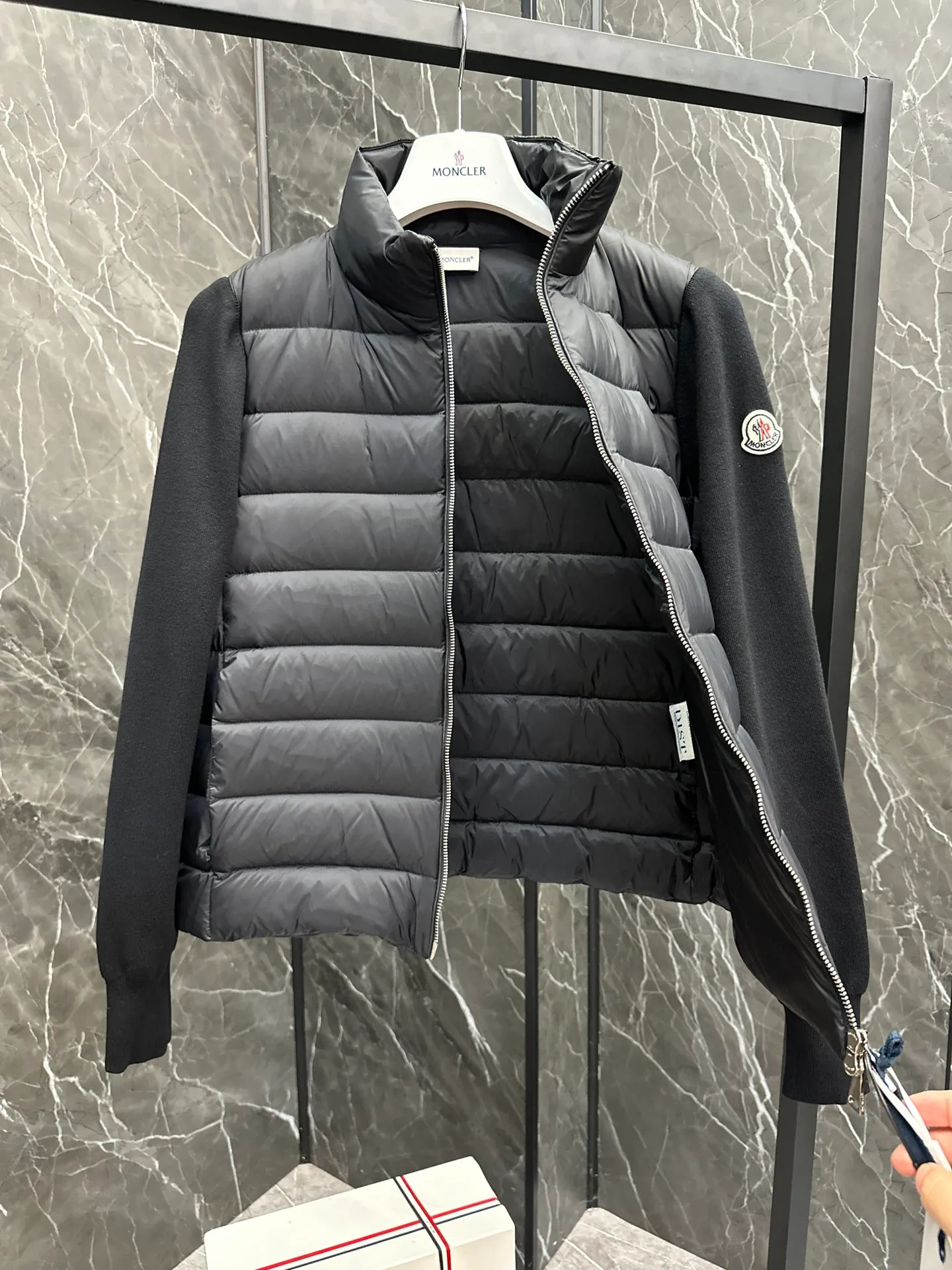 P660 New in Down⬆️Moncler Cardigan Women's Lightly Padded Wool Down Cardigan Jacket. This women's wool cardigan is filled with down and is suitable for all seasons.  This cardigan is a classic Moncler design that can be worn on its own when the weather is nice, or paired with jackets and coats when the weather cools down. Wool knit style with down-filled front for warmth and protection. Details Made of fine wool and nylon léger brillant •Nylon léger brillant lining •Down filling •Jersey knit •14 gauge •Zip closure •Zip pockets Size : 1-3 Black White