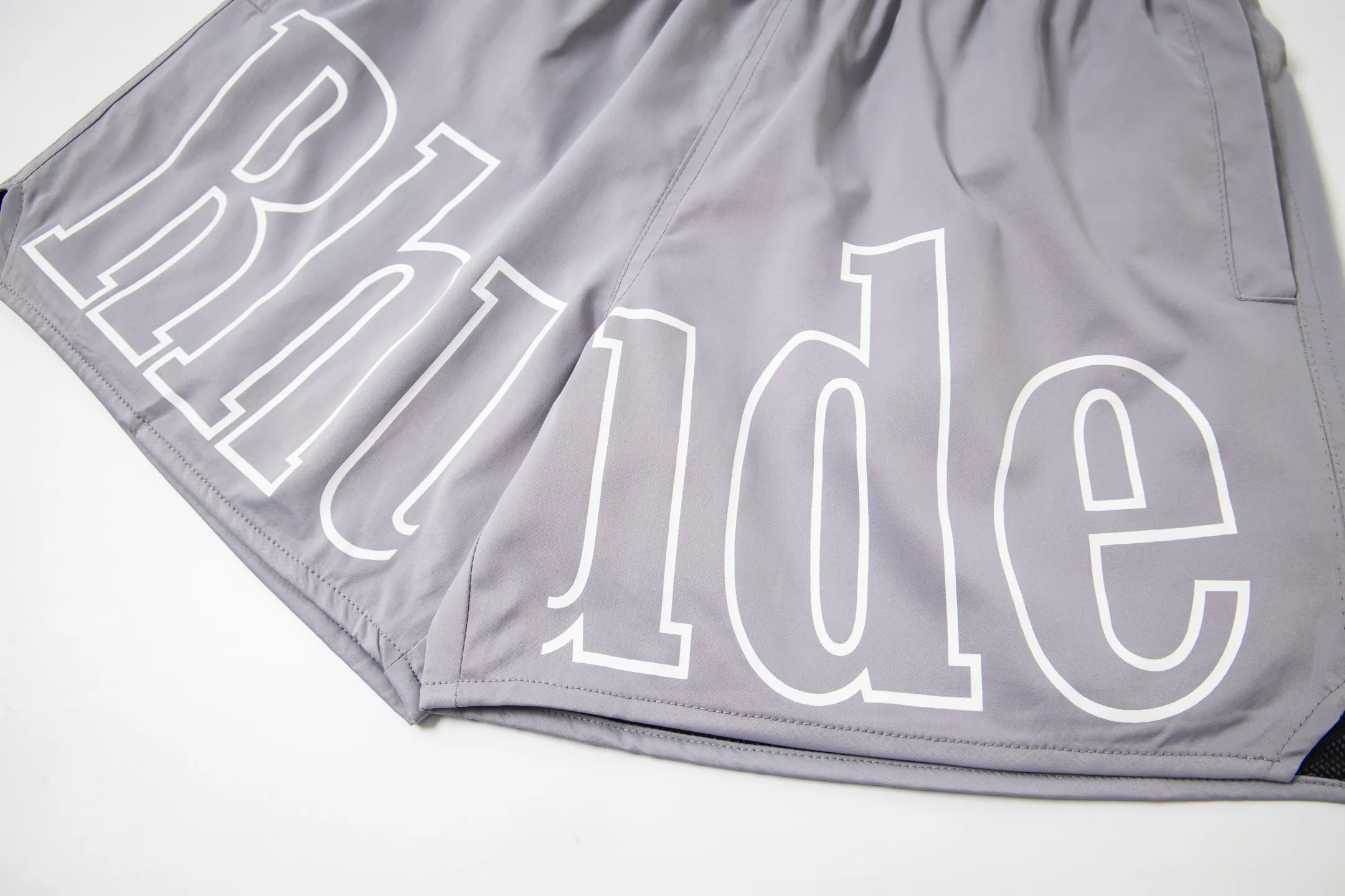 809#P150 Rhude American trendy brand quick-drying beach pants elastic waist shorts letter printed trendy lining mesh men's loose sports pants Color: Black Gray Green Blue Fabric: 150g nylon 100% polyester Size: S M L XL