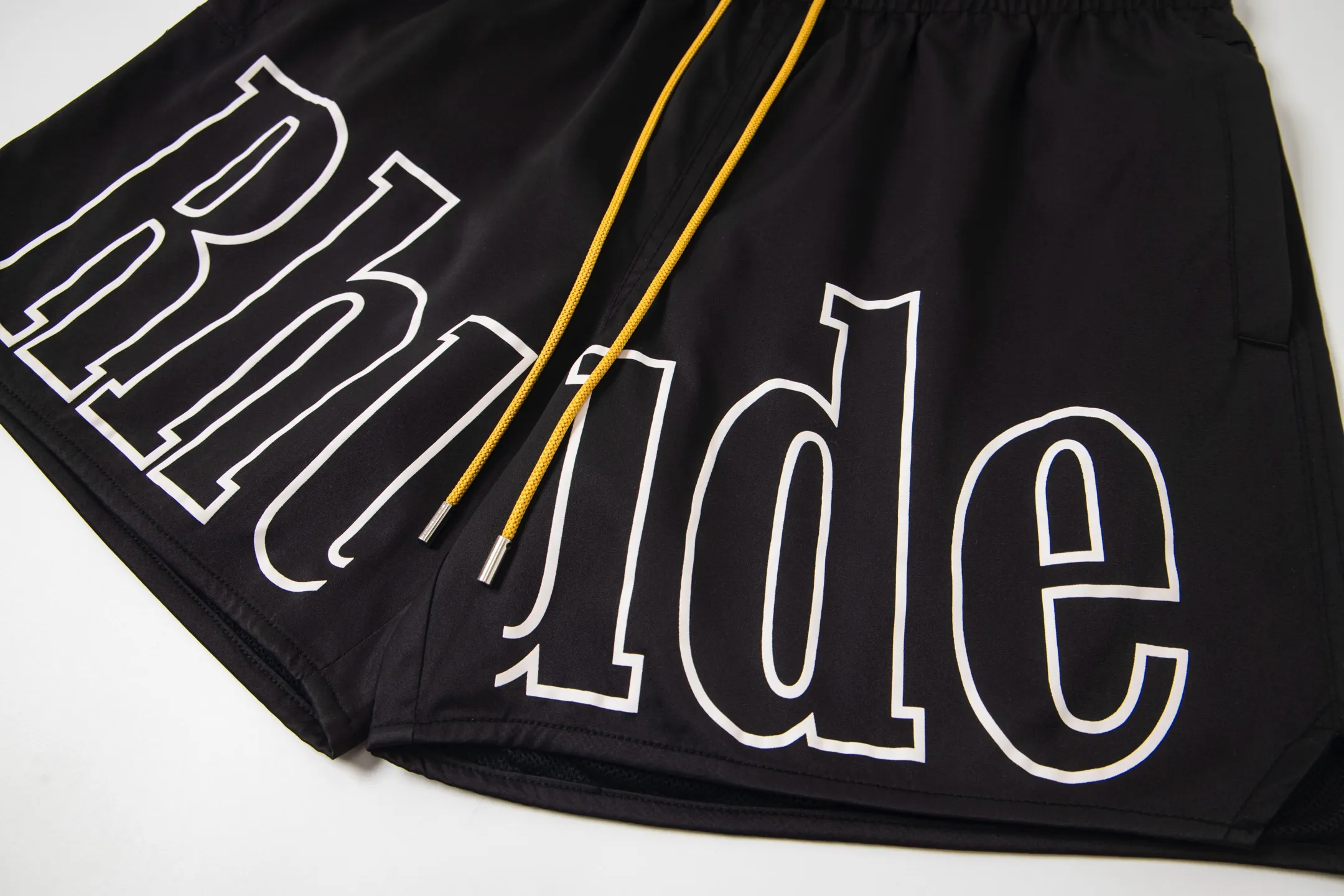 809#P150 Rhude American trendy brand quick-drying beach pants elastic waist shorts letter printed trendy lining mesh men's loose sports pants Color: Black Gray Green Blue Fabric: 150g nylon 100% polyester Size: S M L XL