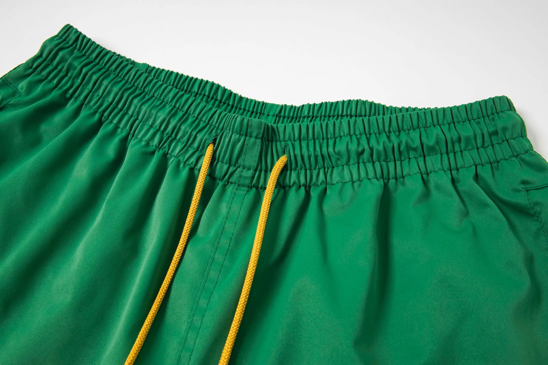 809#P150 Rhude American trendy brand quick-drying beach pants elastic waist shorts letter printed trendy lining mesh men's loose sports pants Color: Black Gray Green Blue Fabric: 150g nylon 100% polyester Size: S M L XL