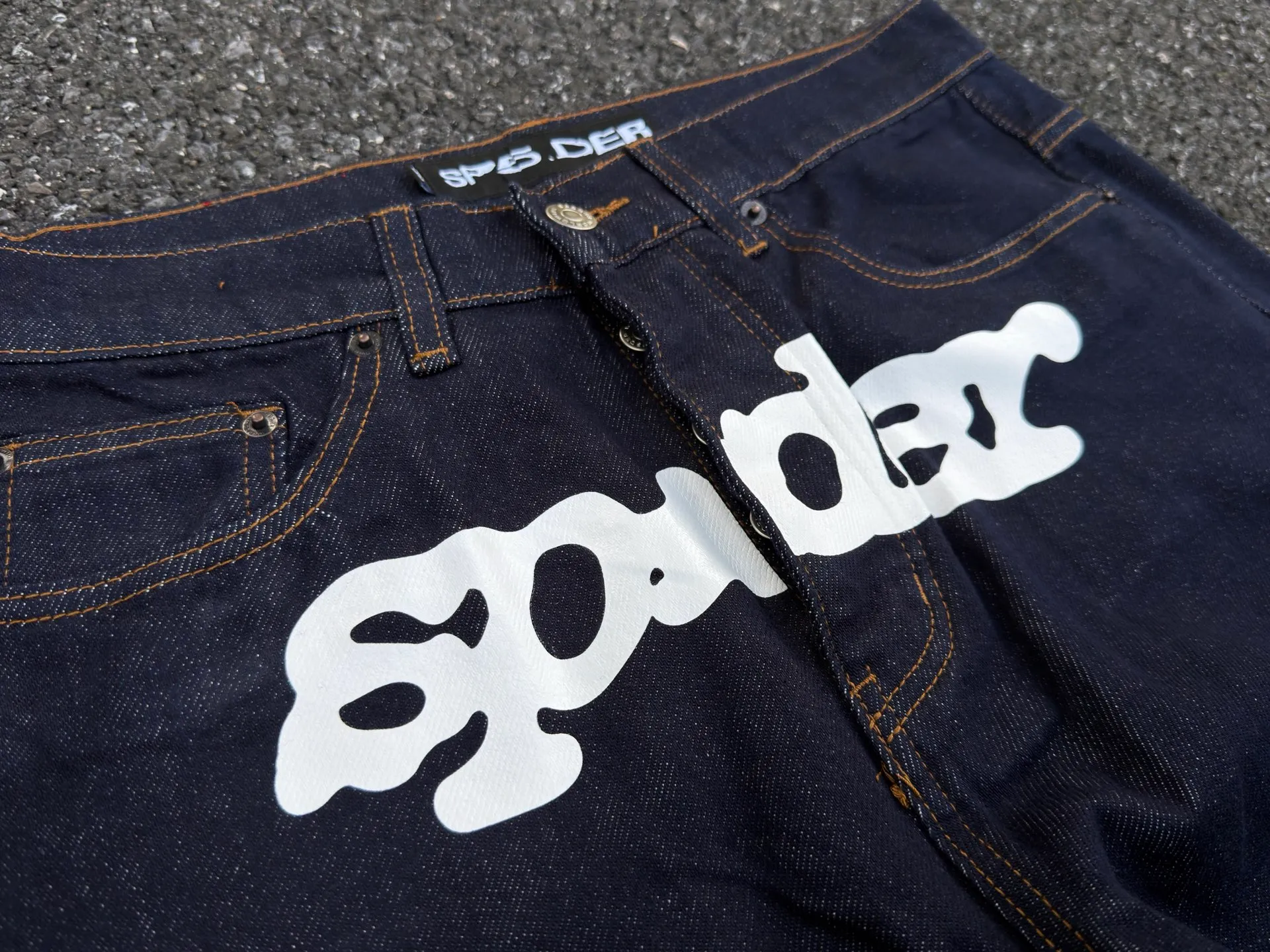 P210 (original outdoor picture direct) top version Sp10der street fashion brand printed washed and distressed casual jeans for men and women, same style. Size: 28 30 32 34 36