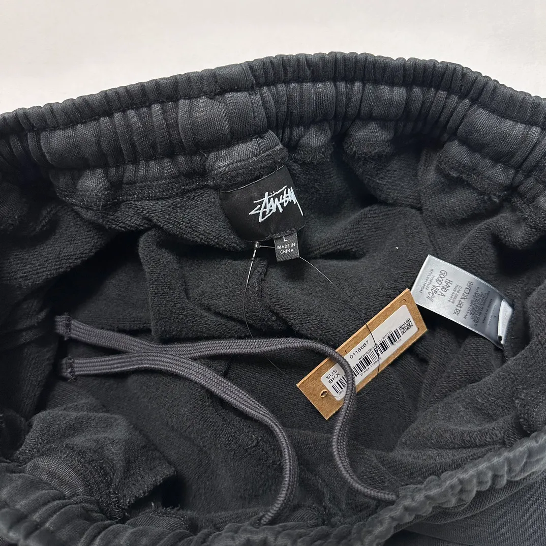 Details Washed sweatpants STUSSY FW24 FLEECE PANT FADED GRAPHIC Loose velvet sweatpants with logo on the side, washed black S- XL