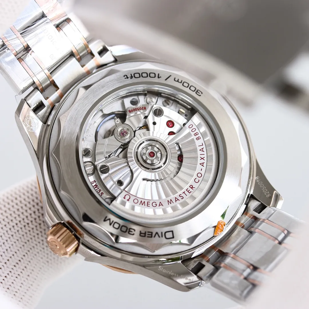 【Top replica】💰4500! OMEGA SEAMASTER Planet Ocean 300m 300m Coaxial Master Chronometer 42mm 42mm Diving Watch 210.30.42.20.01.001 Stainless steel brushed case is partially polished The bezel is made of black ceramic and decorated with white enamel diving scales The bezel scale is not easy to wear and fade Ratchet-type countdown bezel rotates counterclockwise in one direction Dome-shaped sapphire mirror coated with anti-glare film Polished black ceramic dial, laser engraved ripple pattern, with a calendar window at 6 o'clock, the hollow hands and embossed hour scales are rhodium-plated and covered with Super-LumiNova luminous coating, blue and green two-color luminous, green luminous minute hand display with green luminous dot on the bezel for diving oxygen countdown, multiple waterproof screw-in crown, can be worn for real sea diving, conical shaped helium exhaust valve, corrugated edge design is transparent The beautiful movement of the movement is clearly visible on the back of the watch, replica of the 8800 movement, ⚠️ detailed double T shock absorber, brushed steel strap, the strap is disassembled with screws on both sides like the original, independent fixed rod design strap in the middle, double folding snap buckle, with push-button fine-tuning extension, can be opened and extended to wear on the surface of the diving suit when diving, comes with NATO gray and black nylon strap, which can be easily replaced to switch different wearing styles, watch diameter 42mm Real shots of shipment